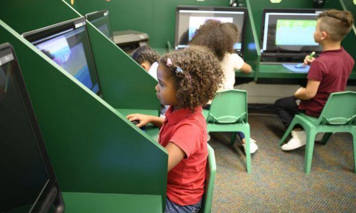Young girl on a computer