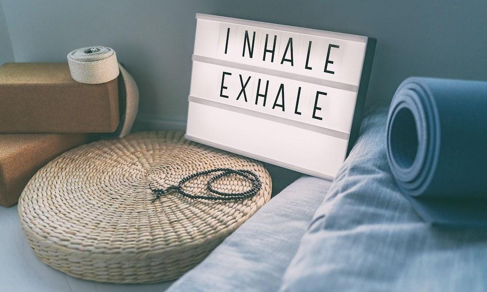 yoga equipment with a sign that says inhale exhale